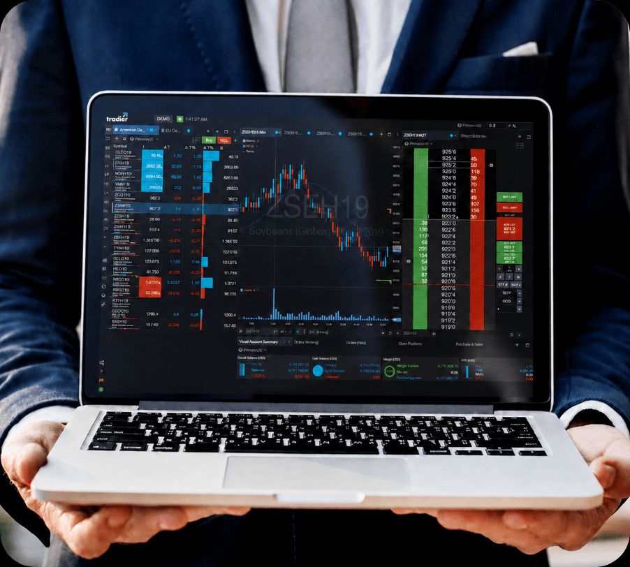 Tradier trading platform dashboard displayed on a laptop screen